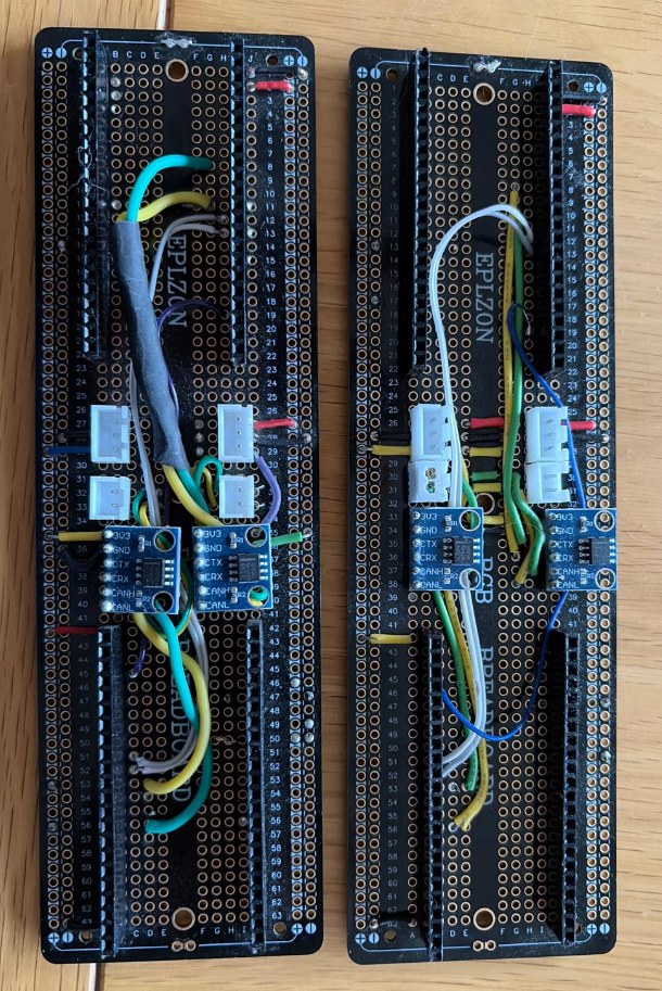 Two breadboards each with a CAN transceiver module, wired together